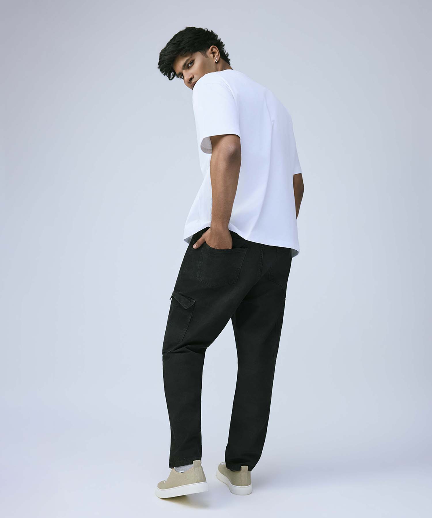 White Oversized Tee Styled with Black Pants